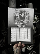 Load image into Gallery viewer, I Like My Parades Black 2026 Calendar
